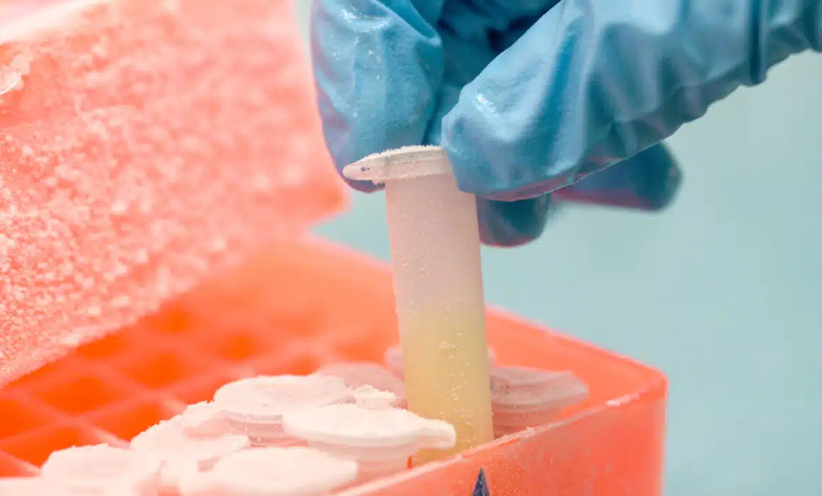 removing a vial from a tray
